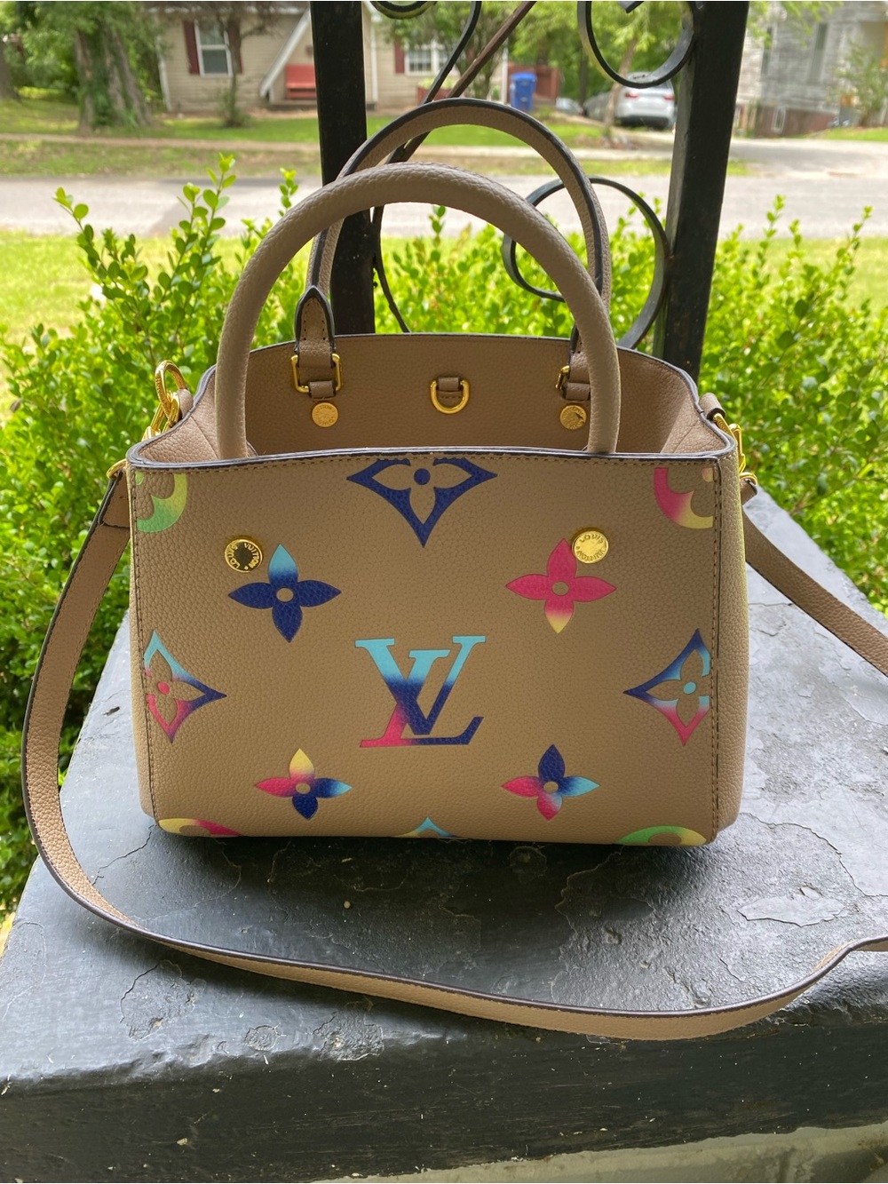 Not Authentic Louis Vuitton Taupe Satchel with Multicolor Monogram Accents.